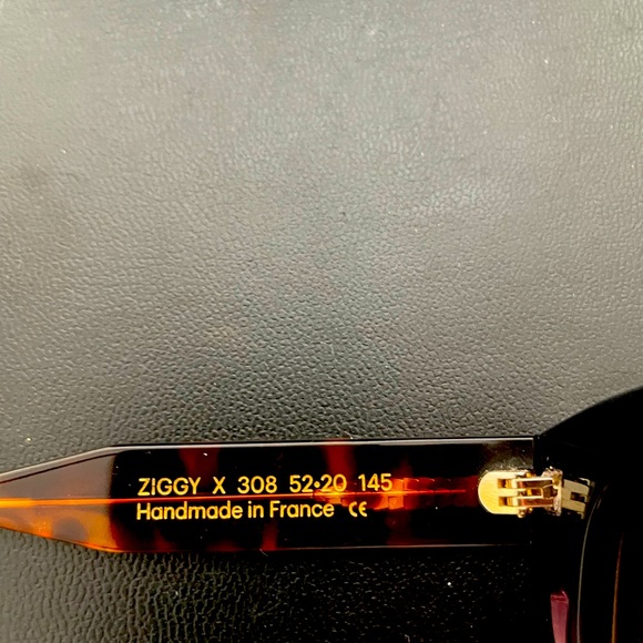 These emmanuelle Khanh sunglasses are brown and clear. - Picture 3 of 3